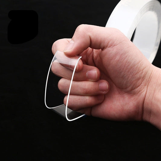 Hand holding a roll of clear tape with text 'Easy to tear, no residue' on a black background