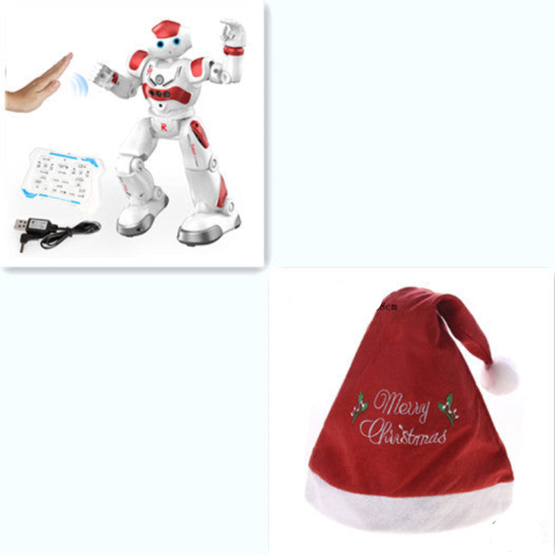 White robot toy with red accents on a white background, next to a red 'Merry Christmas' hat with white text.