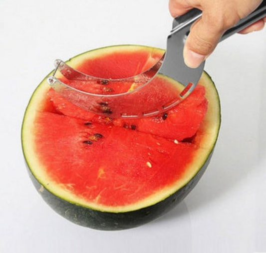 Watermelon being sliced with a special cutter on a white background