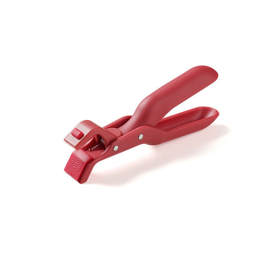 Red plastic clamp on a white background