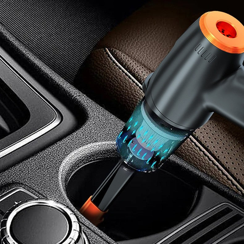 Car air freshener with blue and orange design in a car's cup holder.