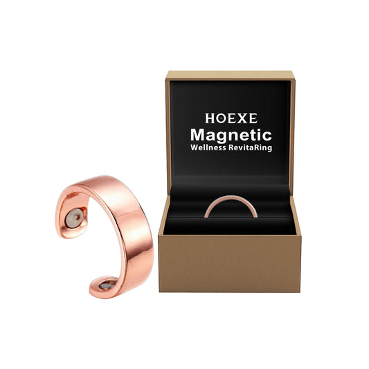 Rose gold magnetic wellness revita ring with open black box displaying 'HOEXE Magnetic Wellness RevitaRing' on a white background.