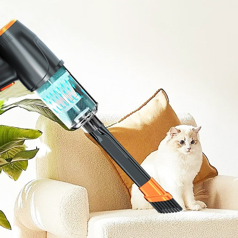 Handheld vacuum cleaner with brush attachment on a couch next to a cat