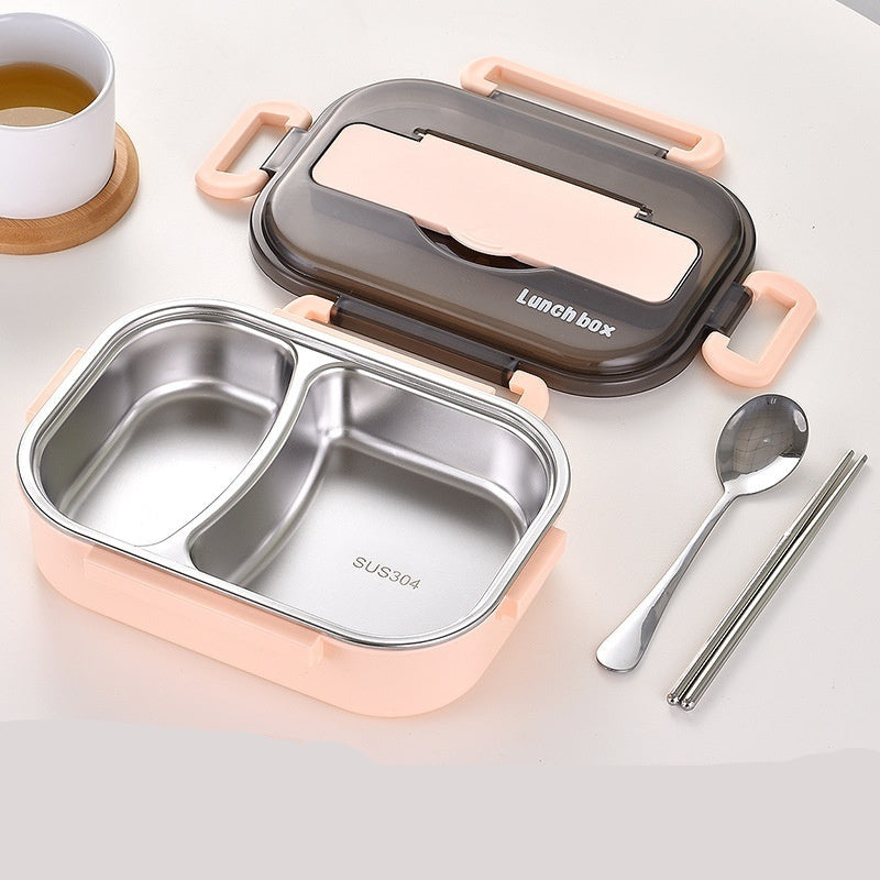 Lunch box with pink handles and compartments, accompanied by a spoon and chopsticks on a light background.