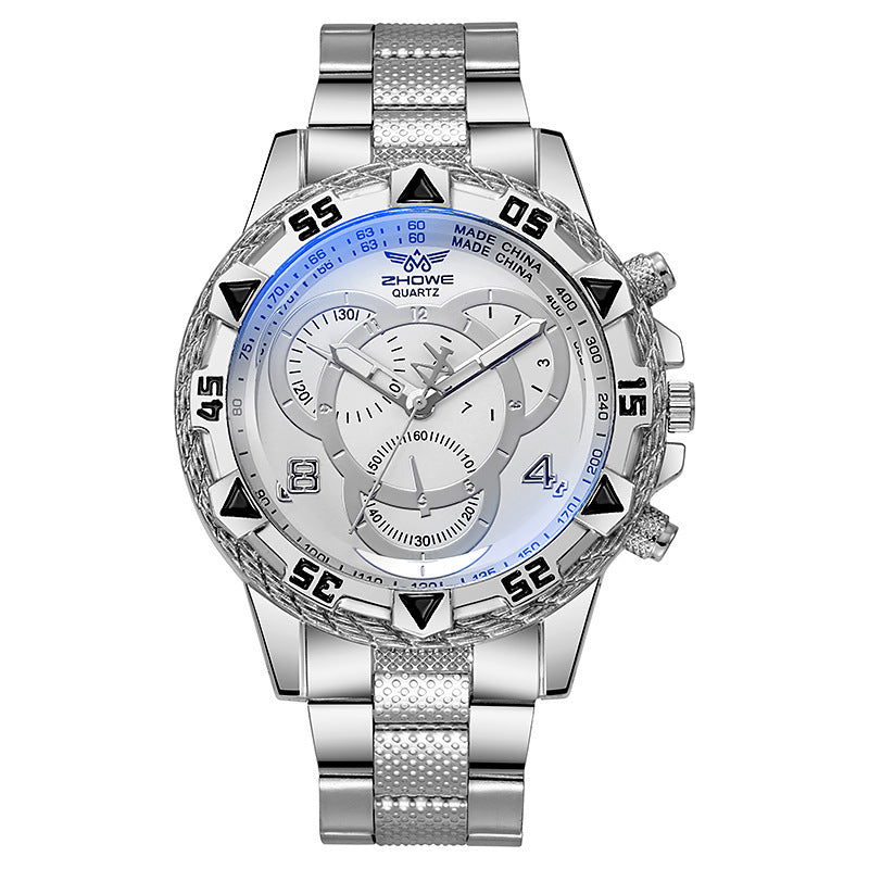 Silver wristwatch with a detailed face on a white background