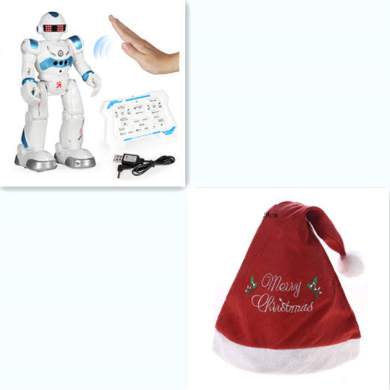 Robot toy with remote control and a red Christmas hat with 'Merry Christmas' text on a white background.