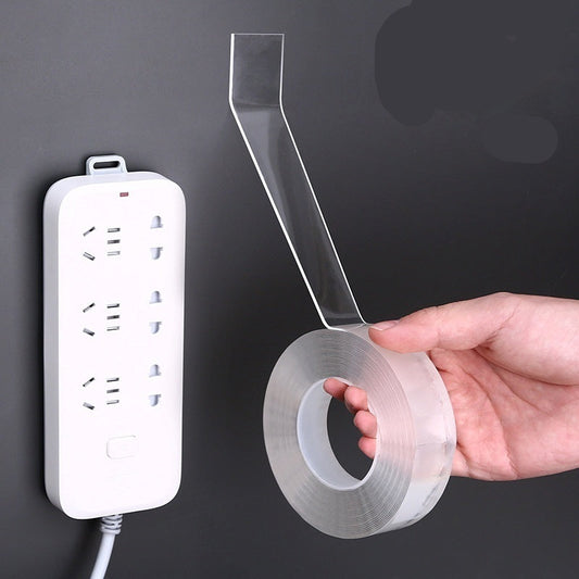 White power strip with clear tape on a dark background