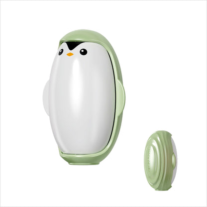 Penguin-shaped device with a white face and green body on a white background