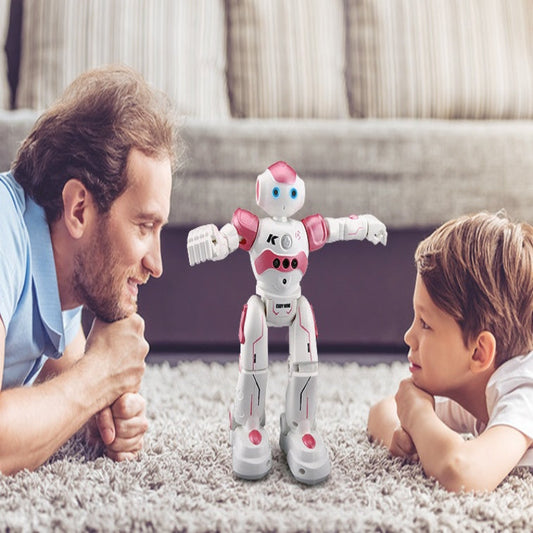 Man and child playing with a robot toy on a carpeted floor.