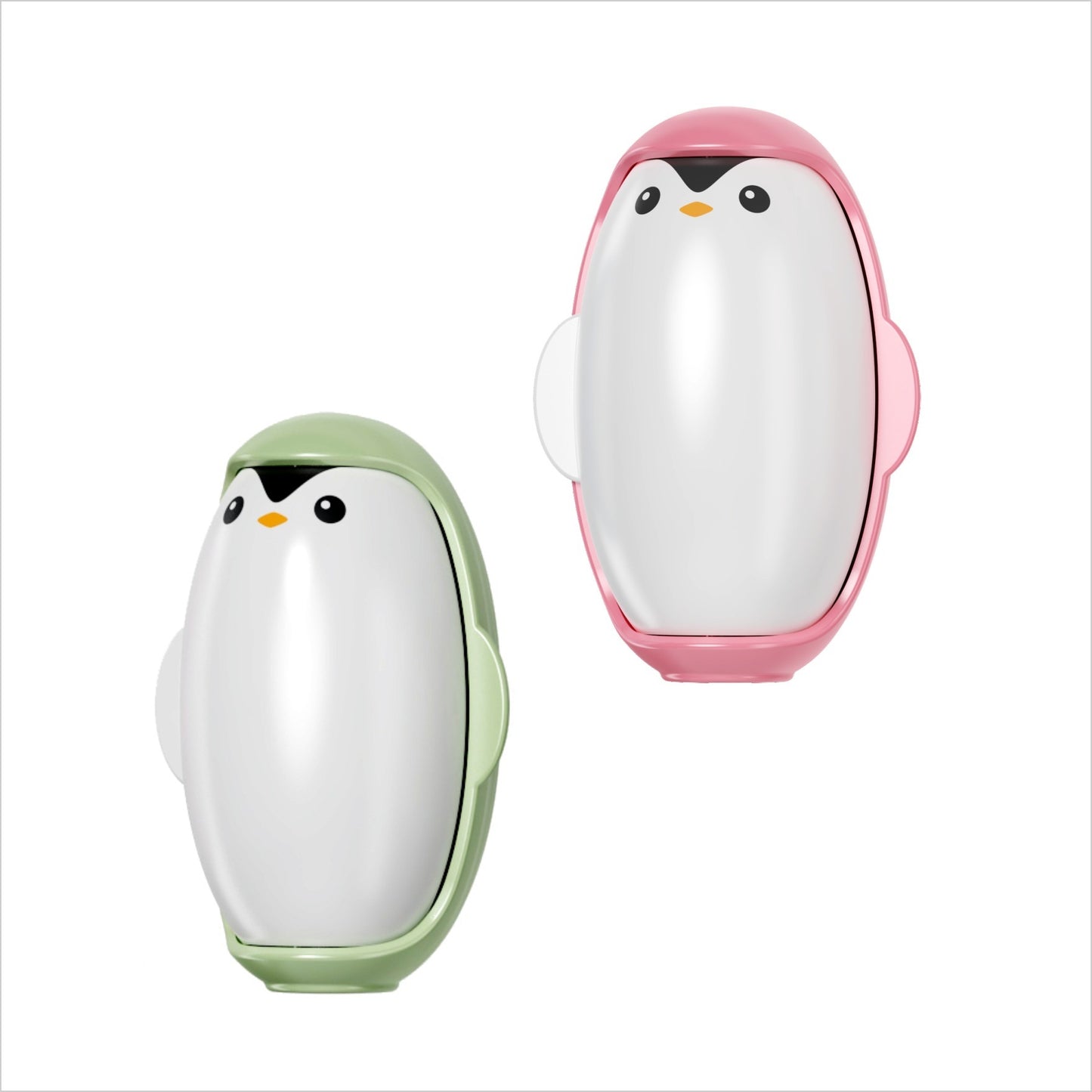 Two penguin-shaped hand warmers, one green and one pink, on a white background.