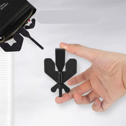 Small black tool held by a hand with text 'Mini Size For Travel' on a white background
