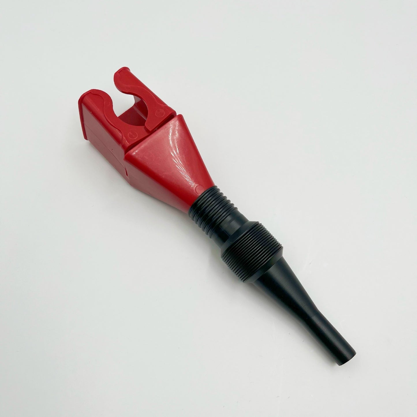 Red and black tool funnel  on a white background