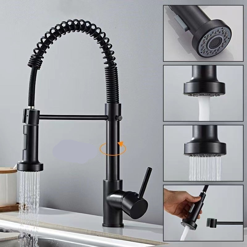 Black kitchen faucet with flexible hose and multiple spray heads on a gray background