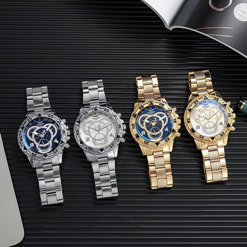 Four watches in silver and gold on a black textured surface