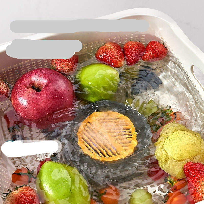 Fruits and vegetables being washed in a sink with text about whirlpool cleaning.
