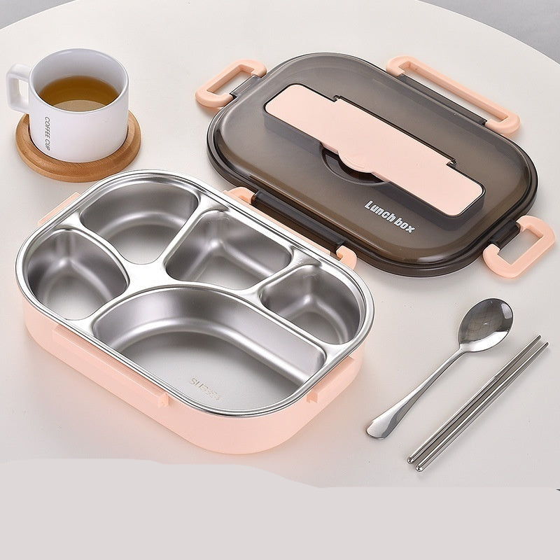 Pink lunch box with compartments, spoon, and chopsticks on a light background