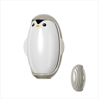 Penguin-shaped electronic device on a white background