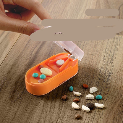 Pill divider with colorful pills on a wooden surface, labeled 'Quick dividing tablets'.