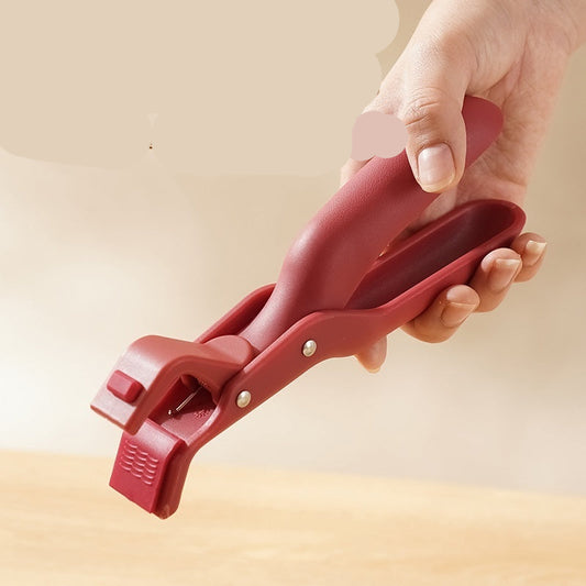 Red handle tool held by a hand with text describing its suitability for small hands.
