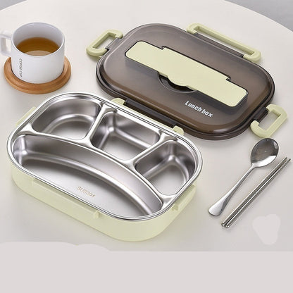Lunch box set with compartments, spoon, and chopsticks on a white surface.