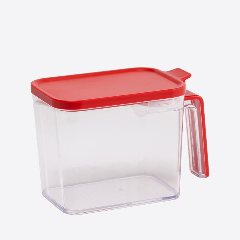 Clear container with a red lid on a white background