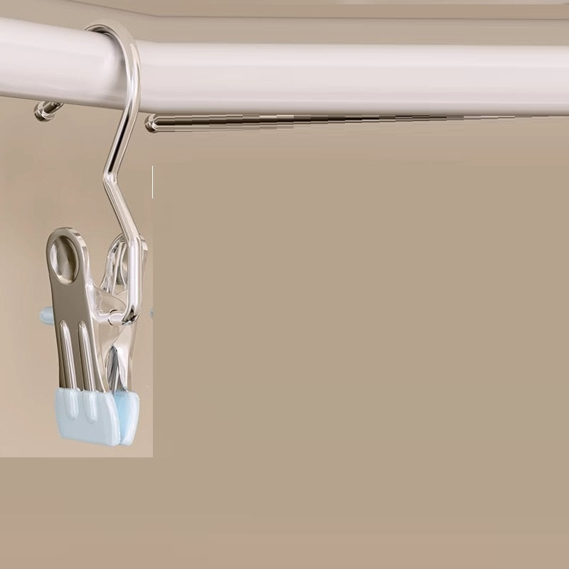 Clear plastic clip on a beige background