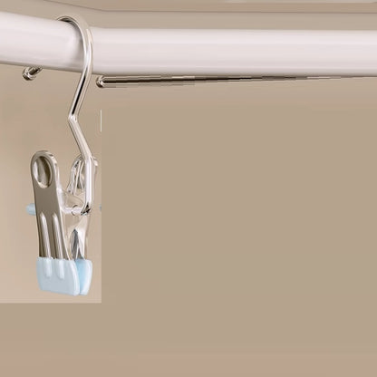Clear plastic clip on a beige background