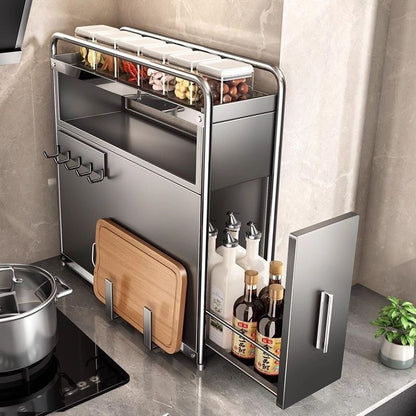 Kitchen storage organizer with cutting boards, bottles, and containers on a kitchen counter.