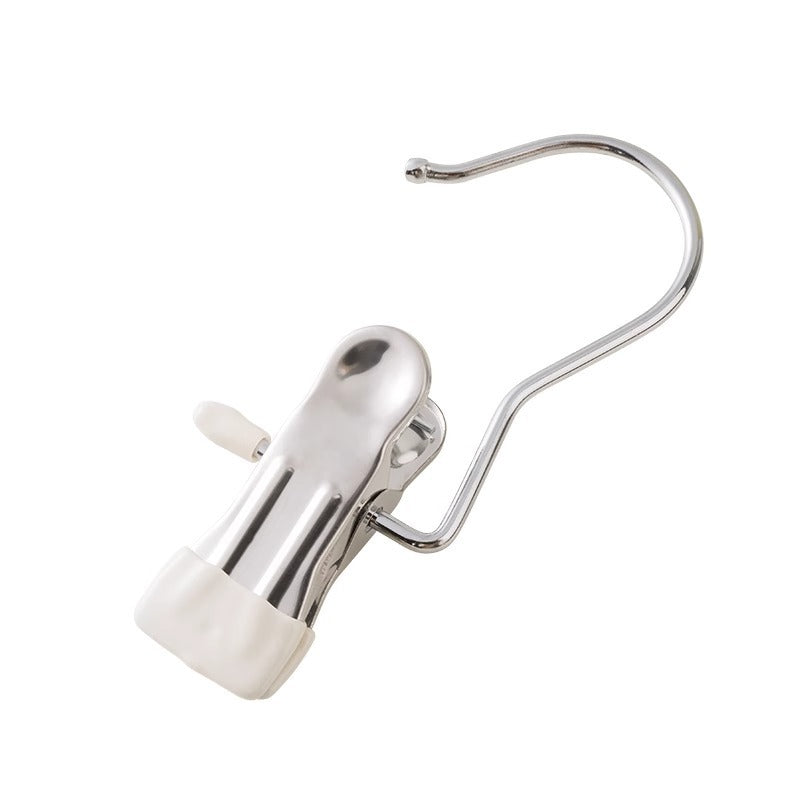 Metallic shower curtain hook on a white background
