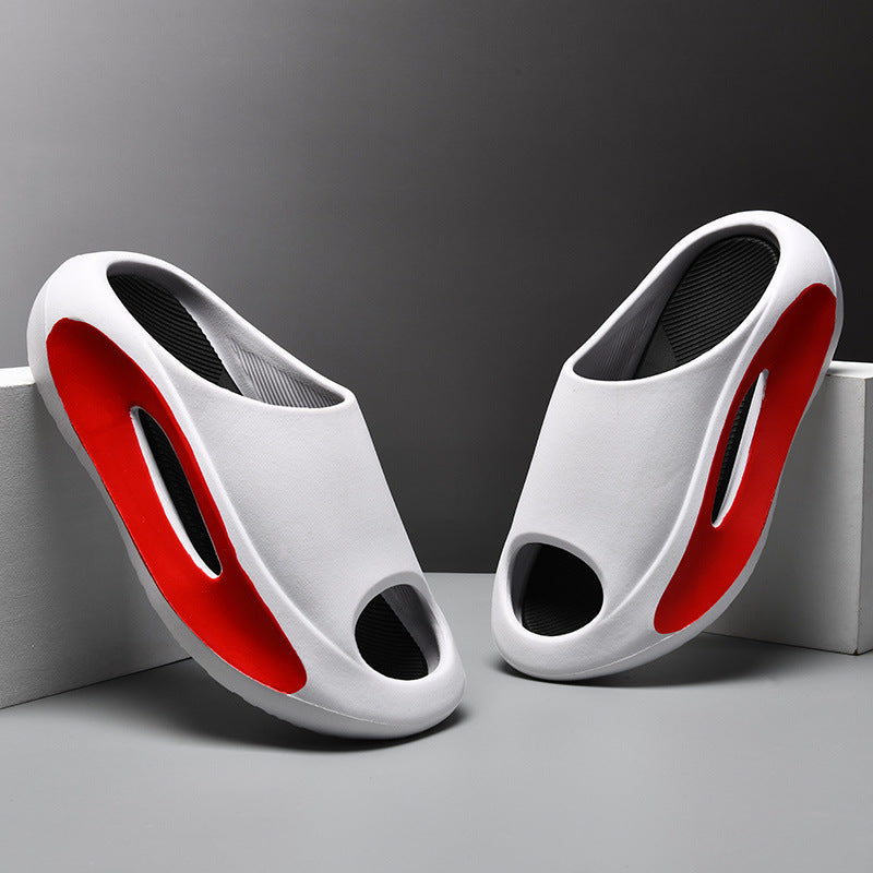 White slippers with red interior on a gray background