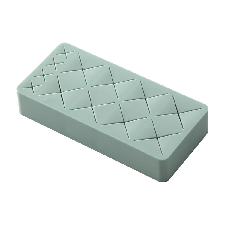 Rectangular light blue ice cube tray on a white background
