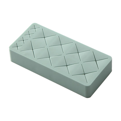 Rectangular light blue ice cube tray on a white background