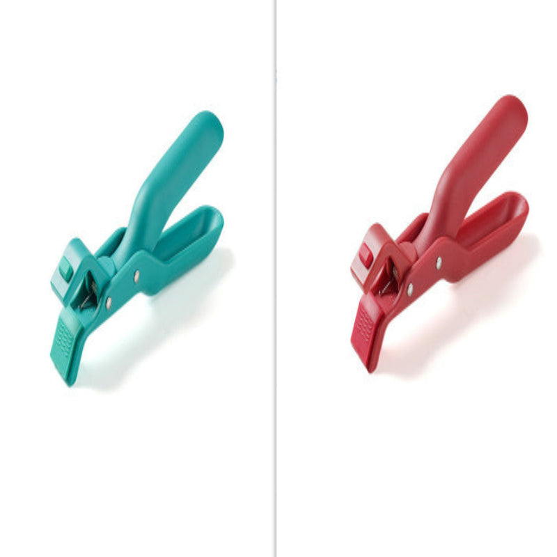 Teal and red clamps on a white background