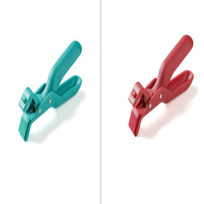 Teal and red clamps on a white background