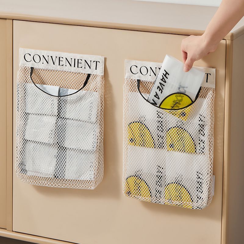 Mesh storage bags labeled 'CONVENIENT' attached to a wooden cabinet.
