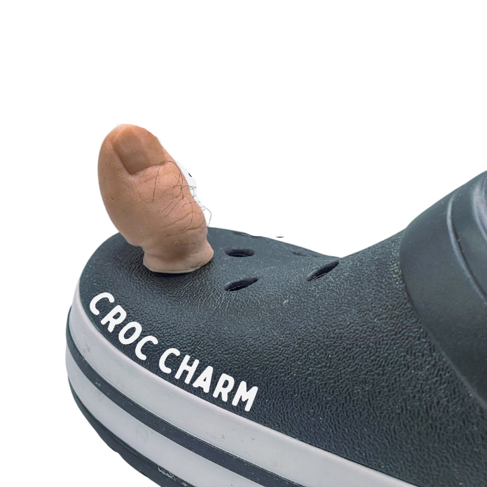 Croc charm shaped like a big toe on a gray croc shoe with 'Billy's Big Toe' text.